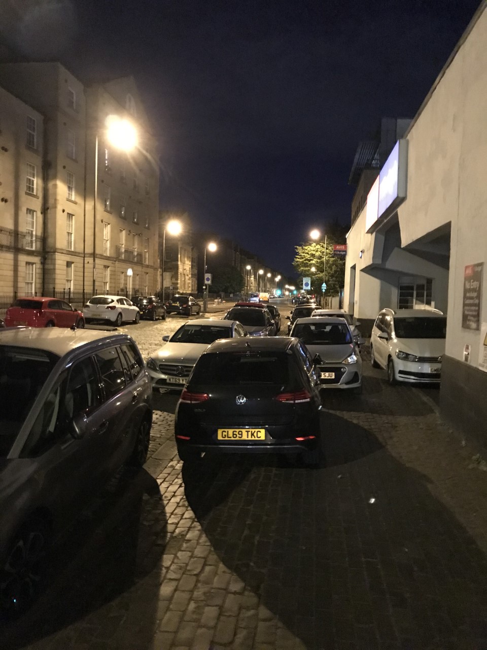 parked cars in the dark