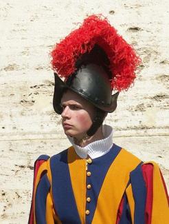 Pontifical guardsman with helmet like spiked railing finial.