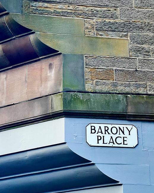 sign on colourful masonry
